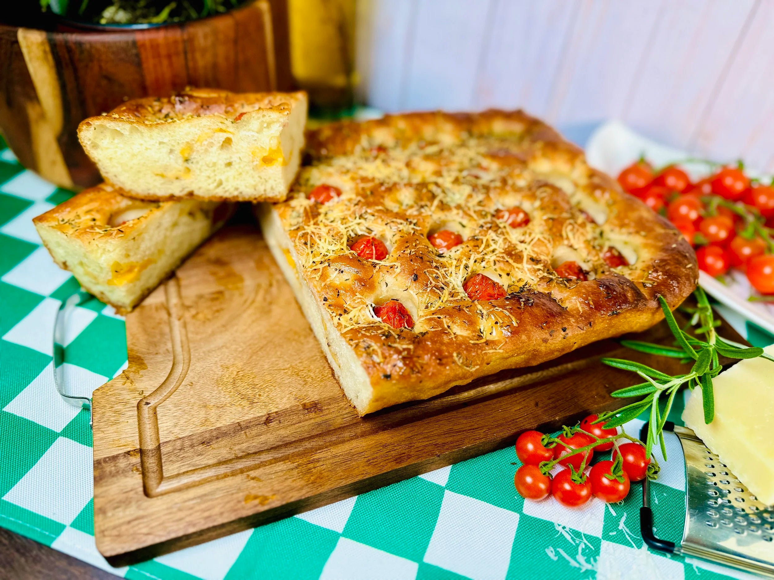Focaccia bread with cherry tomatoes and cheese